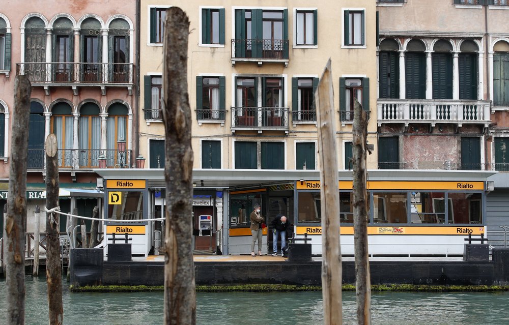 wait for a ferry in Venice