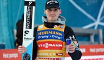 Domen Prevc celebrates winning the 74th Four Hills Tournament in Bischofshofen, Austria, January 2026.