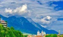Skyline of Innsbruck, Austria, with the Nordkette mountain range in the background.