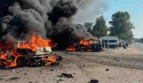Destroyed structures and burning vehicles following Russian missile strikes in the Kharkiv region.
