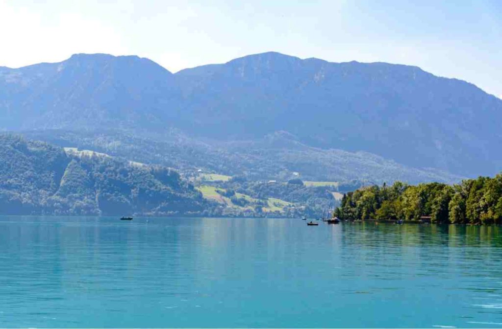 Landscape view across Lake Attersee toward mountain shores in Upper Austria.