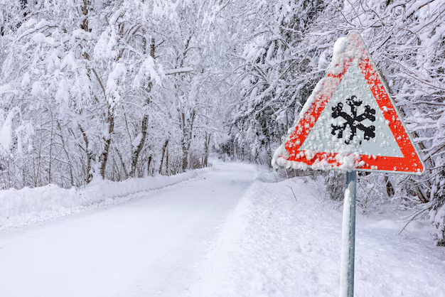 Warning sign for black ice on a road in Lower Austria